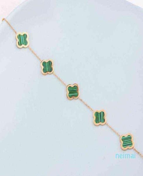 luxurious quality brand name flower with five flower nature stone pendant bracelet with rhombus clasp for women wedding gift8845698, Golden;silver
luxurious quality brand name flower with five flower nature stone pendant bracelet with rhombus clasp for women wedding gift8845698, Golden;silver