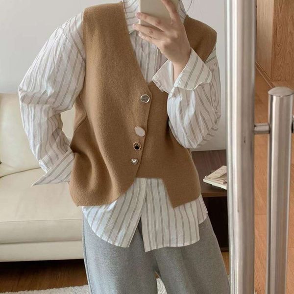 japanese and korean baroque simple vest with irregular buttons knitted cardigan for women autumn winter design, Black;white
japanese and korean baroque simple vest with irregular buttons knitted cardigan for women autumn winter design, Black;white