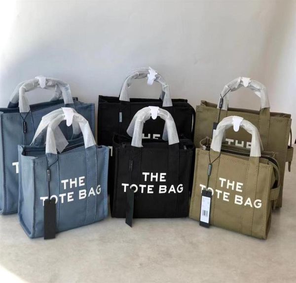 2023 marjobs womens totes bags cosmetic bags with shoulder strap bag canvasleather woody tote handbags 24cm 32cm two size l009222665130
2023 marjobs womens totes bags cosmetic bags with shoulder strap bag canvasleather woody tote handbags 24cm 32cm two size l009222665130