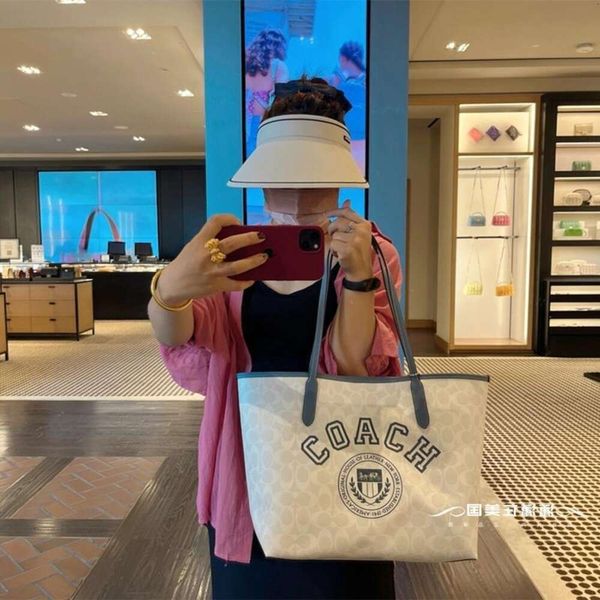 women's handbags designer bags tote co kou ach august new bag city tote milk tea color print one shoulder handheld shopping tote bag fa
women's handbags designer bags tote co kou ach august new bag city tote milk tea color print one shoulder handheld shopping tote bag fa