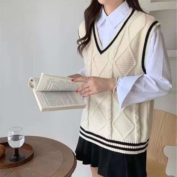 sleeveless vest preppy sweater spring and autumn design korean loose pure color twisted knitted v neck women, Black;white
sleeveless vest preppy sweater spring and autumn design korean loose pure color twisted knitted v neck women, Black;white