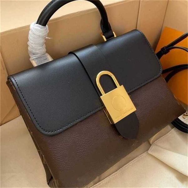 high-end designer evening bag women's cross-body handbag classic presbyopia handheld clamshell lock purse two-color match shoulder unde
high-end designer evening bag women's cross-body handbag classic presbyopia handheld clamshell lock purse two-color match shoulder unde