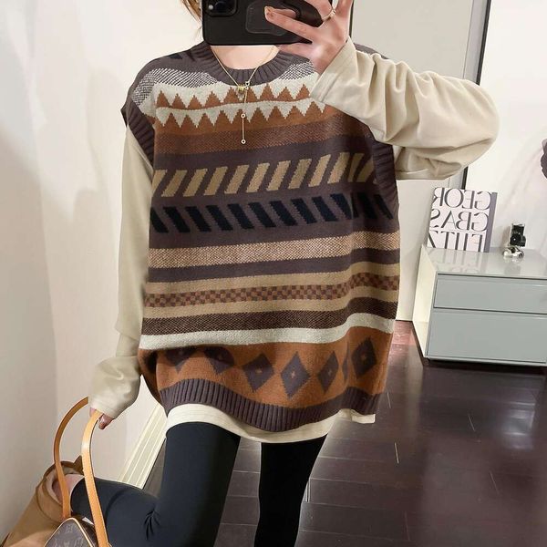large sized contrasting colors diamond striped vest knitted loose lazy sleeveless sweater for women in, Black;white
large sized contrasting colors diamond striped vest knitted loose lazy sleeveless sweater for women in, Black;white