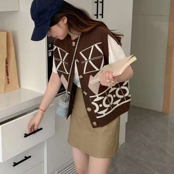 autumn and winter retro knitted cardigan vest female korean style folding wear with college sweater jacket, Black;white
autumn and winter retro knitted cardigan vest female korean style folding wear with college sweater jacket, Black;white