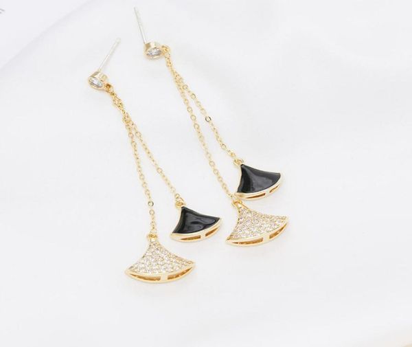 new brand fanshaped ginkgo leaf s925 silver needle long tassel earrings jewelry 18k gold plated highend sparkling zircon earring484022016
new brand fanshaped ginkgo leaf s925 silver needle long tassel earrings jewelry 18k gold plated highend sparkling zircon earring484022016
