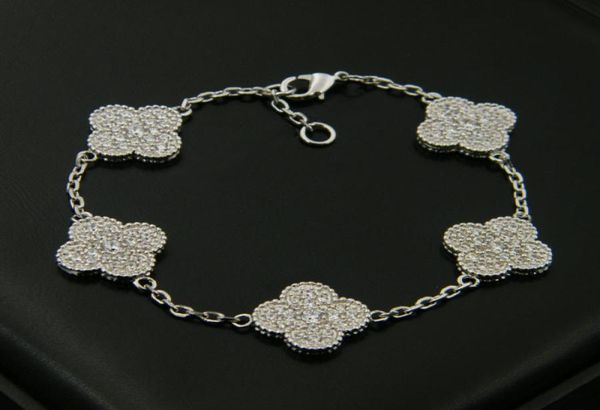new 18k gold plated five flowers women charm bracelet for gift1385154, Golden;silver
new 18k gold plated five flowers women charm bracelet for gift1385154, Golden;silver