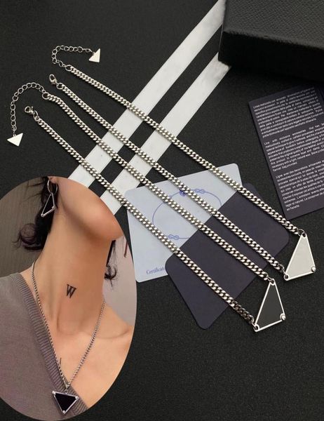 2021 womens mens luxury designer necklace chain fashion jewelry black and white triangle pendant design party silver hip hop punk7815605 
2021 womens mens luxury designer necklace chain fashion jewelry black and white triangle pendant design party silver hip hop punk7815605