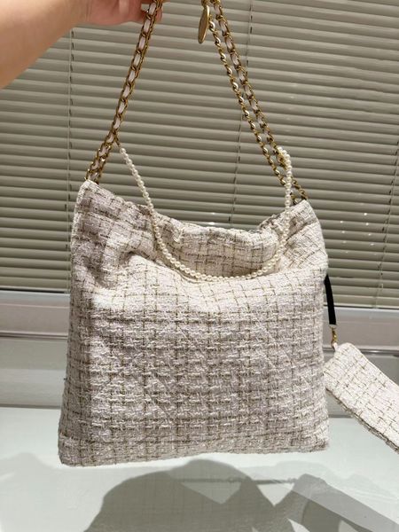 autumn and winter new luxury fashion design women's classic gold pearl chain bag soft woolen woven bag retro versatile
autumn and winter new luxury fashion design women's classic gold pearl chain bag soft woolen woven bag retro versatile