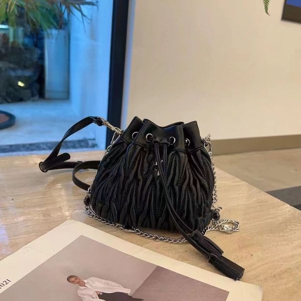 new pleated foreign style mini drawstring bucket bag cowhide armpit bag fashion all shoulder crossbody bag factory direct sales
new pleated foreign style mini drawstring bucket bag cowhide armpit bag fashion all shoulder crossbody bag factory direct sales