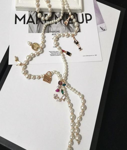 long simulated pearl necklace for women no5 pendant long necklace trendy design style pearl tassel1077040, Golden;silver
long simulated pearl necklace for women no5 pendant long necklace trendy design style pearl tassel1077040, Golden;silver