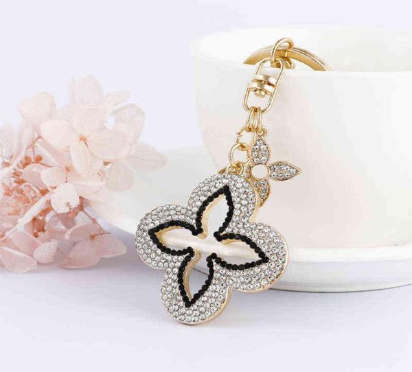 2021 exquisite clover key chain creative full rhinestone keychain fashion keyring women bag charm pendant car key ring whole a4882114, Silver
2021 exquisite clover key chain creative full rhinestone keychain fashion keyring women bag charm pendant car key ring whole a4882114, Silver