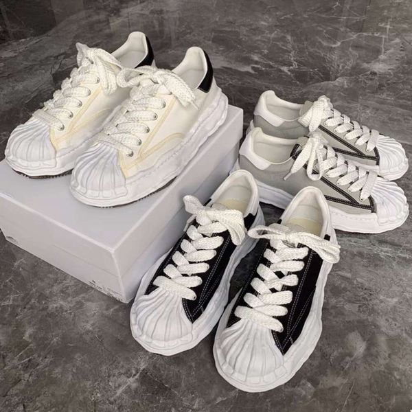 maison mihara yasuhiro dissolved shoes mmy blakey shell head classic thick sole casual shoes for men and women black canvas shoes
maison mihara yasuhiro dissolved shoes mmy blakey shell head classic thick sole casual shoes for men and women black canvas shoes