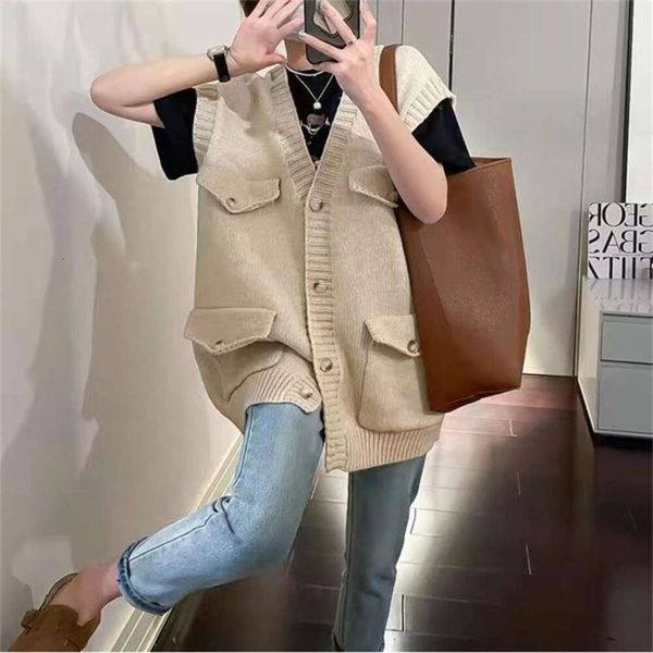 knitted sweater vest outer womens loose large pocket sleeves folded cardigan clothing, Black;white
knitted sweater vest outer womens loose large pocket sleeves folded cardigan clothing, Black;white