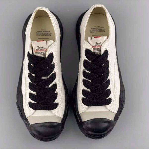 dissolve mmy shoes canvas shoes luxury men women's shoes lace sneakers maison mihara yasuhiro black white outdoor jogging casual shoes
dissolve mmy shoes canvas shoes luxury men women's shoes lace sneakers maison mihara yasuhiro black white outdoor jogging casual shoes