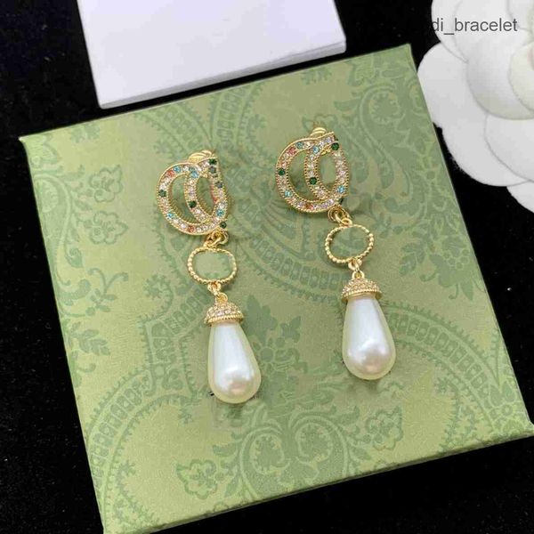 fashion pearl long earrings designer charm earrings for woman brass fashion jewelry supply, Golden
fashion pearl long earrings designer charm earrings for woman brass fashion jewelry supply, Golden