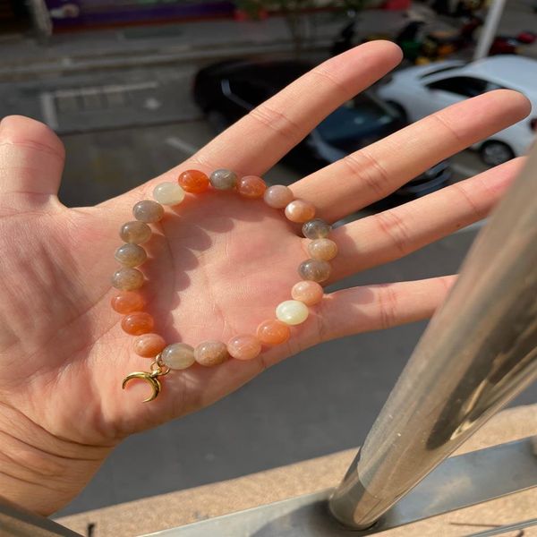 new mg1112 mixed moonstone bracelet with small moon pendant in gold bracelet198p, Black
new mg1112 mixed moonstone bracelet with small moon pendant in gold bracelet198p, Black