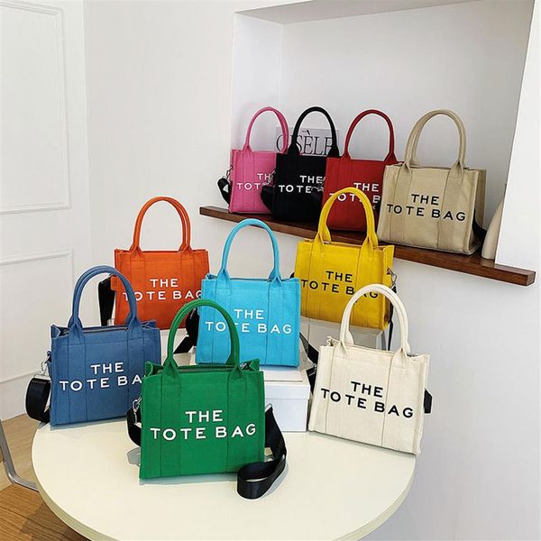 the tote bag famous designer canvas totes women handbag new summer fashion shoulder messager bags245s, Red;black
the tote bag famous designer canvas totes women handbag new summer fashion shoulder messager bags245s, Red;black