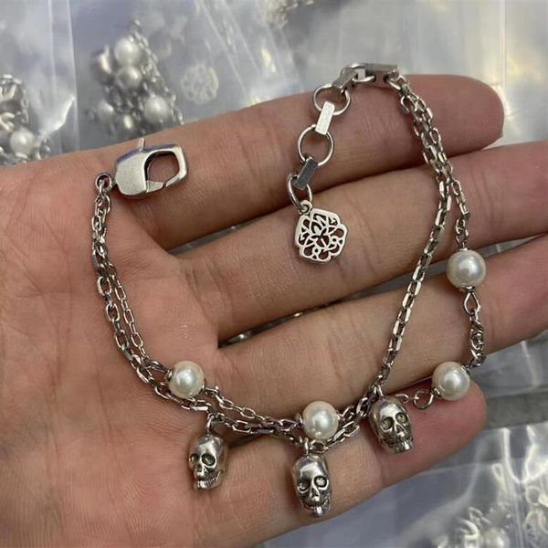 double layer chain pearl skull pendant bracelets gold silver skull skeleton ladies luxurious eternal love bangle for women meb1k073012, Golden;silver
double layer chain pearl skull pendant bracelets gold silver skull skeleton ladies luxurious eternal love bangle for women meb1k073012, Golden;silver
