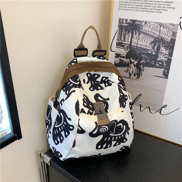 factory wholesale women shoulder bag 3 colors street totem printed handbag soft and light stitching oxford leisure backpack retro buckle stu
factory wholesale women shoulder bag 3 colors street totem printed handbag soft and light stitching oxford leisure backpack retro buckle stu
