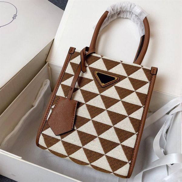 triangle mark embroidery fabric mini tote bag brown black cute crossbody with long leather strap designer lady purses with handle258u
triangle mark embroidery fabric mini tote bag brown black cute crossbody with long leather strap designer lady purses with handle258u