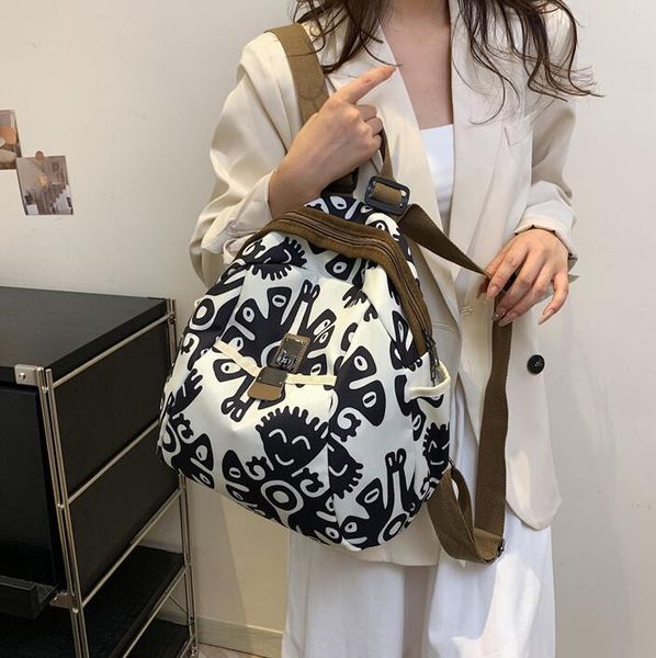 Factory wholesale women shoulder bag 3 colors street totem printed handbag soft and light stitching Oxford leisure backpack retro buckle student backpacks 2055#, Clear
Factory wholesale women shoulder bag 3 colors street totem printed handbag soft and light stitching Oxford leisure backpack retro buckle student backpacks 2055#, Clear