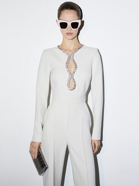 Jumpsuit in crepe fabric with Swarovski and cut out design in front slim style elegant, White
Jumpsuit in crepe fabric with Swarovski and cut out design in front slim style elegant, White