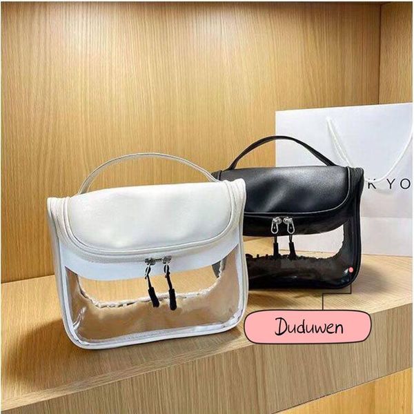 23x18x13cm fashion makeup bag c letters classic pvc transparency comsetics storage bags 2c gift for travel3009
23x18x13cm fashion makeup bag c letters classic pvc transparency comsetics storage bags 2c gift for travel3009