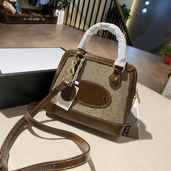 designer- new fashion handbag designer retro letter shell bag women's diagonal shoulder bag2828
designer- new fashion handbag designer retro letter shell bag women's diagonal shoulder bag2828