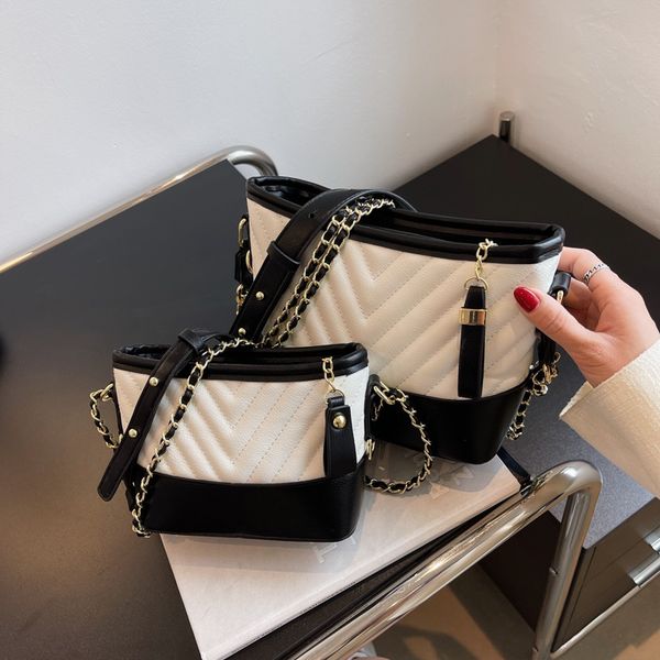 new women's evening bag rhombic chain shoulder bag small fragrance splice handbag simple versatile bucket bags
new women's evening bag rhombic chain shoulder bag small fragrance splice handbag simple versatile bucket bags