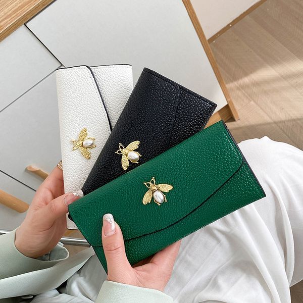 fashion female designer small bee purse new long small thin money clip three fold niche pure color card bag, Red;black
fashion female designer small bee purse new long small thin money clip three fold niche pure color card bag, Red;black