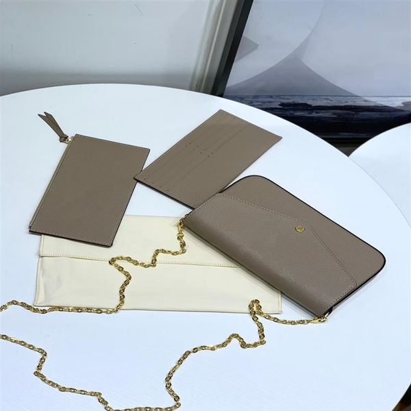 crossbody bag 3 in one flat pocket felicie pochette bicolor empreinte leather envelope style dove cream and black beige color woma195p
crossbody bag 3 in one flat pocket felicie pochette bicolor empreinte leather envelope style dove cream and black beige color woma195p