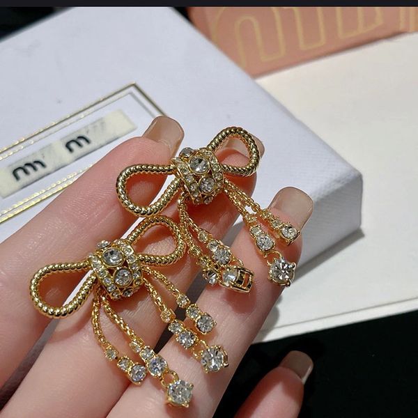 luxury designer jewelry dangle large bowknot with diamond tassel earrings europe america sweet cool girl earings versatile earring, Silver
luxury designer jewelry dangle large bowknot with diamond tassel earrings europe america sweet cool girl earings versatile earring, Silver