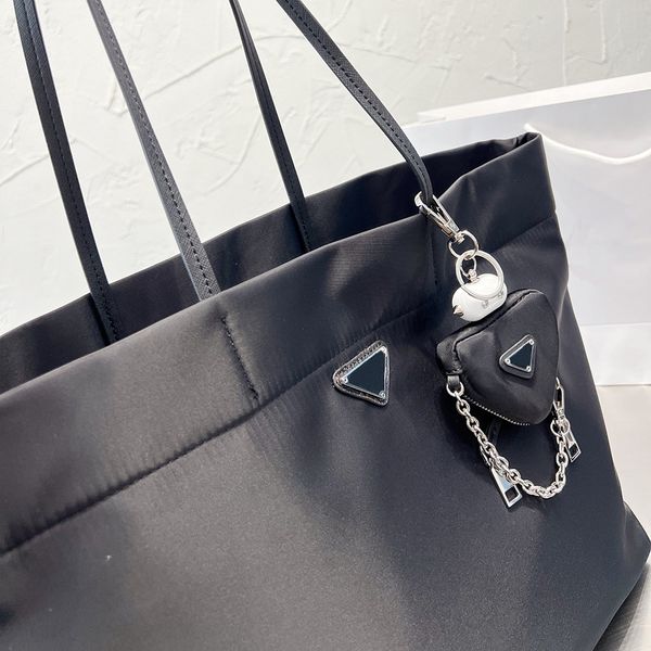 tote bag women designer handbag black nylon lady casual shopping bag big capacity with triangular pouch
tote bag women designer handbag black nylon lady casual shopping bag big capacity with triangular pouch