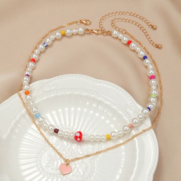chokers korea handmade colorful beaded pearl choker cute mushroom pink heart pendant double layer necklace for women girls jewelry 230103, Golden;silver
chokers korea handmade colorful beaded pearl choker cute mushroom pink heart pendant double layer necklace for women girls jewelry 230103, Golden;silver