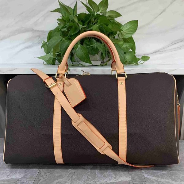 2023 luxury fashion men women travel bag duffle bag brand designer pu leather luggage handbags large capacity sport bag with lock 54cm top
2023 luxury fashion men women travel bag duffle bag brand designer pu leather luggage handbags large capacity sport bag with lock 54cm top