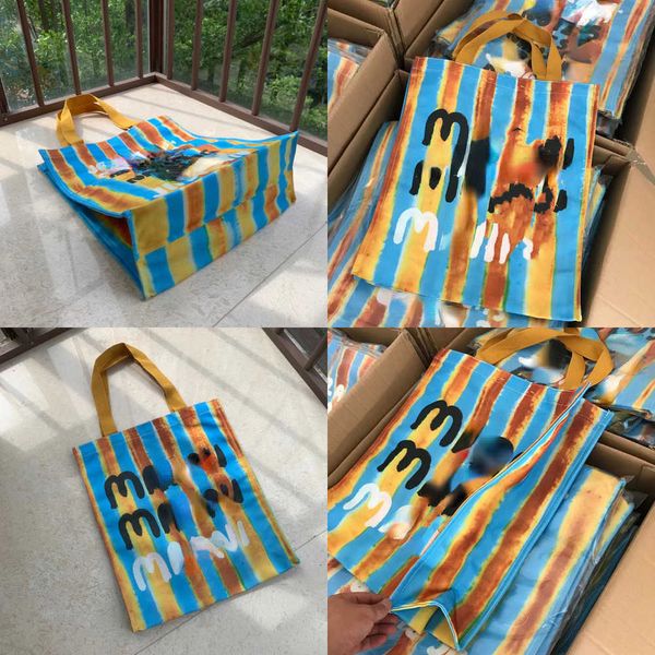 shoulder bags 2023 designer new super capacity personalized canvas bag durable student shopping letter graffiti color matching hand 
shoulder bags 2023 designer new super capacity personalized canvas bag durable student shopping letter graffiti color matching hand