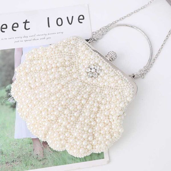 shell dinner bag heavy industry beaded bag pearl banquet hand commuting fashion celebrity temperament cheongsam
shell dinner bag heavy industry beaded bag pearl banquet hand commuting fashion celebrity temperament cheongsam