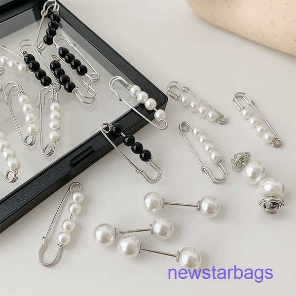 factory outlet wholesale brooches anti glare button pearl brooch waist clip adjust skirt to small clothes pin fixed collar, Gray
factory outlet wholesale brooches anti glare button pearl brooch waist clip adjust skirt to small clothes pin fixed collar, Gray