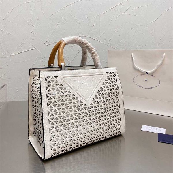 p's 2023 spring and summer new hollow shopping high fashion tote bamboo knot portable large capacity women's bag 75% off online sa
p's 2023 spring and summer new hollow shopping high fashion tote bamboo knot portable large capacity women's bag 75% off online sa