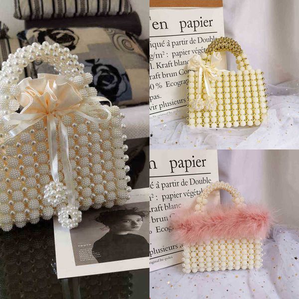 bags faux fur pearl handtas vrouwen nieuwe elegante hand geweven bayberry vormige kralen bal schoudertas vrouwelijke handvat avond tas 22060
bags faux fur pearl handtas vrouwen nieuwe elegante hand geweven bayberry vormige kralen bal schoudertas vrouwelijke handvat avond tas 22060