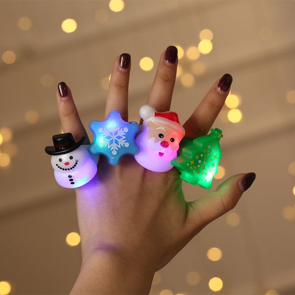 

LED Lighted Toy Flashing Finger Ring Decorative Props Christmas Toys Party Accessories Santa Claus Christmas Tree Snowman Snowflake Elk Rings Glow Toys Gifts