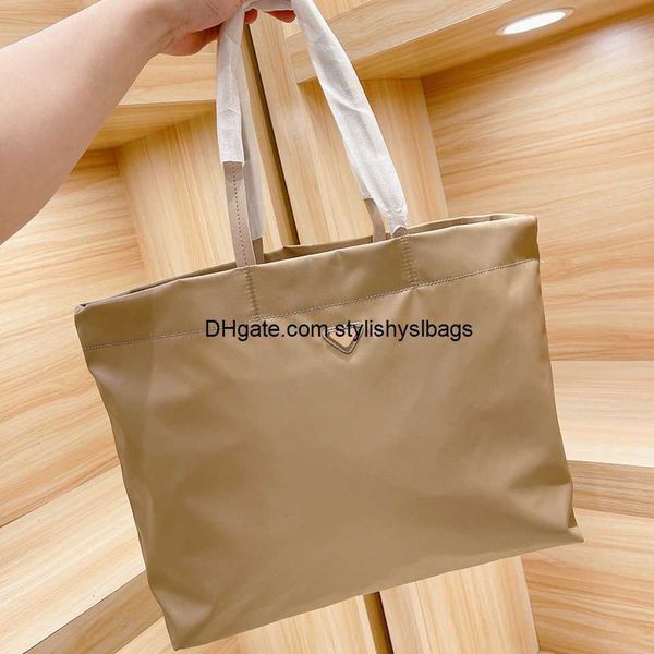 totes khaki color nylon tote bag designer handbag for women high capacity ladies casual shopping bag 48x30cm 010923h
totes khaki color nylon tote bag designer handbag for women high capacity ladies casual shopping bag 48x30cm 010923h