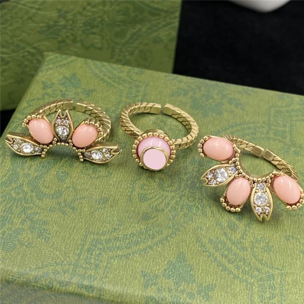 3 piece floral designer rings women diamond flower ring interlocking letters anello personality rings jewelry with box, Silver
3 piece floral designer rings women diamond flower ring interlocking letters anello personality rings jewelry with box, Silver