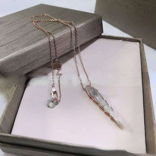 new small snake-shaped pendant diamond-embedded circle hollow tail vertebra clavicle chain europe and america, Silver
new small snake-shaped pendant diamond-embedded circle hollow tail vertebra clavicle chain europe and america, Silver