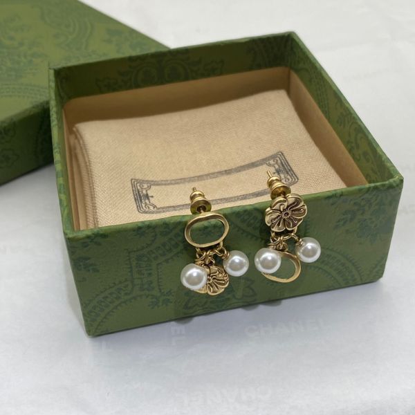 stylish asymmetric pearl flower earrings charm interlocking letter studs ladies floral danglers with box, Golden
stylish asymmetric pearl flower earrings charm interlocking letter studs ladies floral danglers with box, Golden