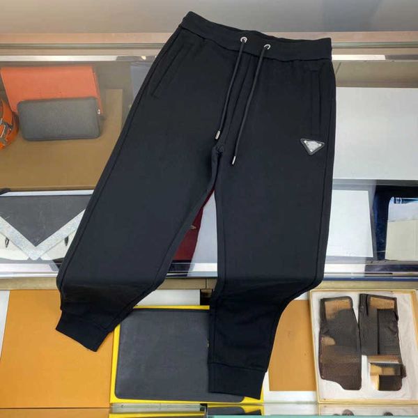 designer pants autumn winter fashion triangle slacks men women sports leggings long sweatpants drawstring trousers 4524, Black 
designer pants autumn winter fashion triangle slacks men women sports leggings long sweatpants drawstring trousers 4524, Black