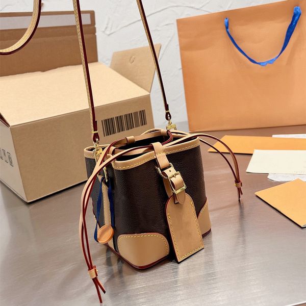 designers lux mini brown rope sealing bucket bag canvas stitching cowhide shoulder bag
designers lux mini brown rope sealing bucket bag canvas stitching cowhide shoulder bag