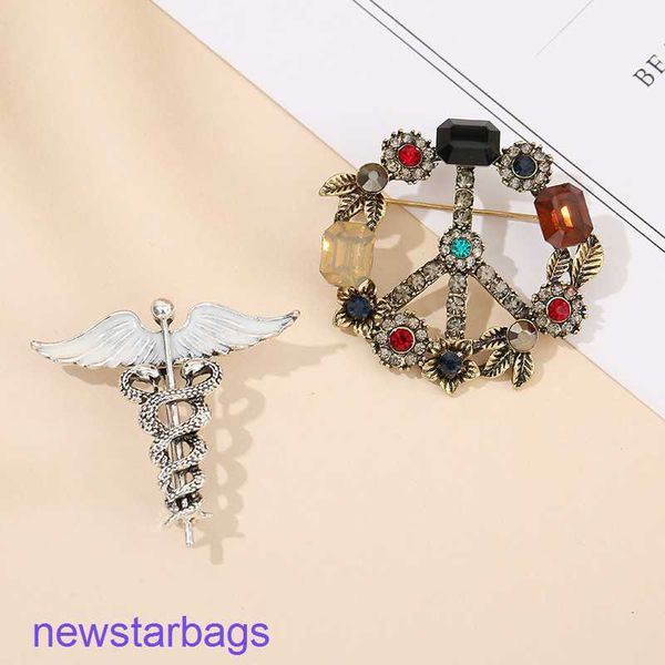 manufacturer gift wholesale alloy diamond inlaid anti nuclear war logo brooch pin high-grade metal badge niche jewelry, Gray
manufacturer gift wholesale alloy diamond inlaid anti nuclear war logo brooch pin high-grade metal badge niche jewelry, Gray