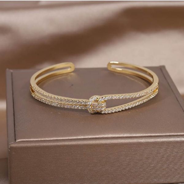 14k real gold plating exquisite luxury full zircon knot bracelet elegant women's wedding party opening adjustable bracelet, White
14k real gold plating exquisite luxury full zircon knot bracelet elegant women's wedding party opening adjustable bracelet, White