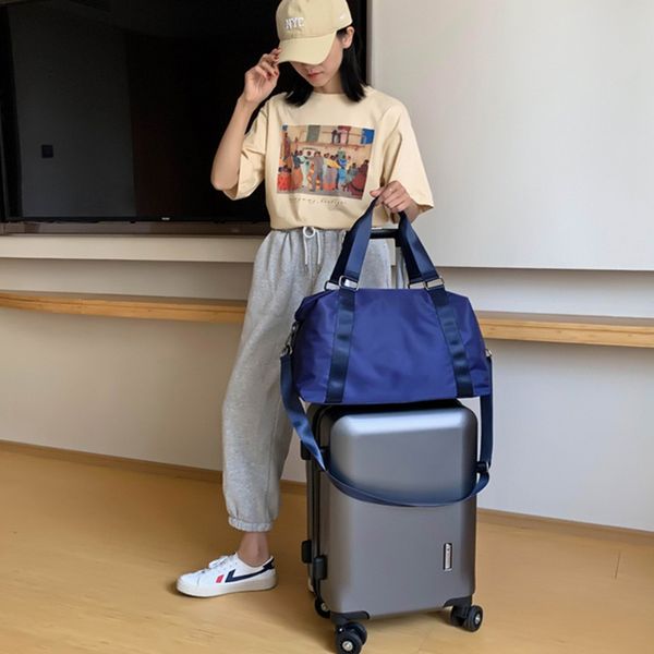 hand yoga bag female we waterproof large luggage bags short travel bag with brand logo
hand yoga bag female we waterproof large luggage bags short travel bag with brand logo